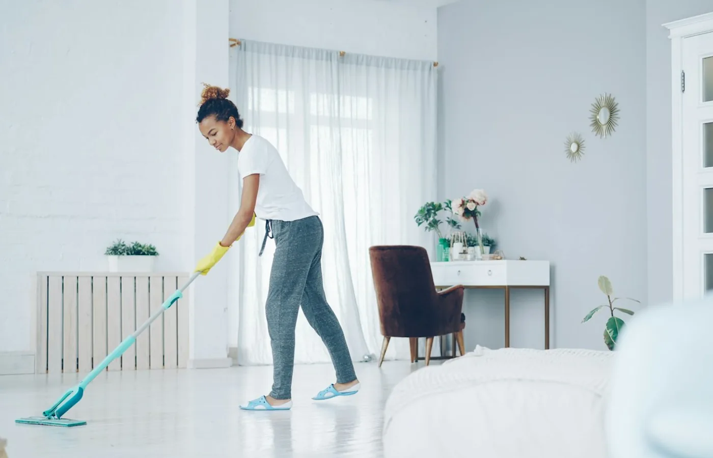 Professional cleaner at work in a client's home